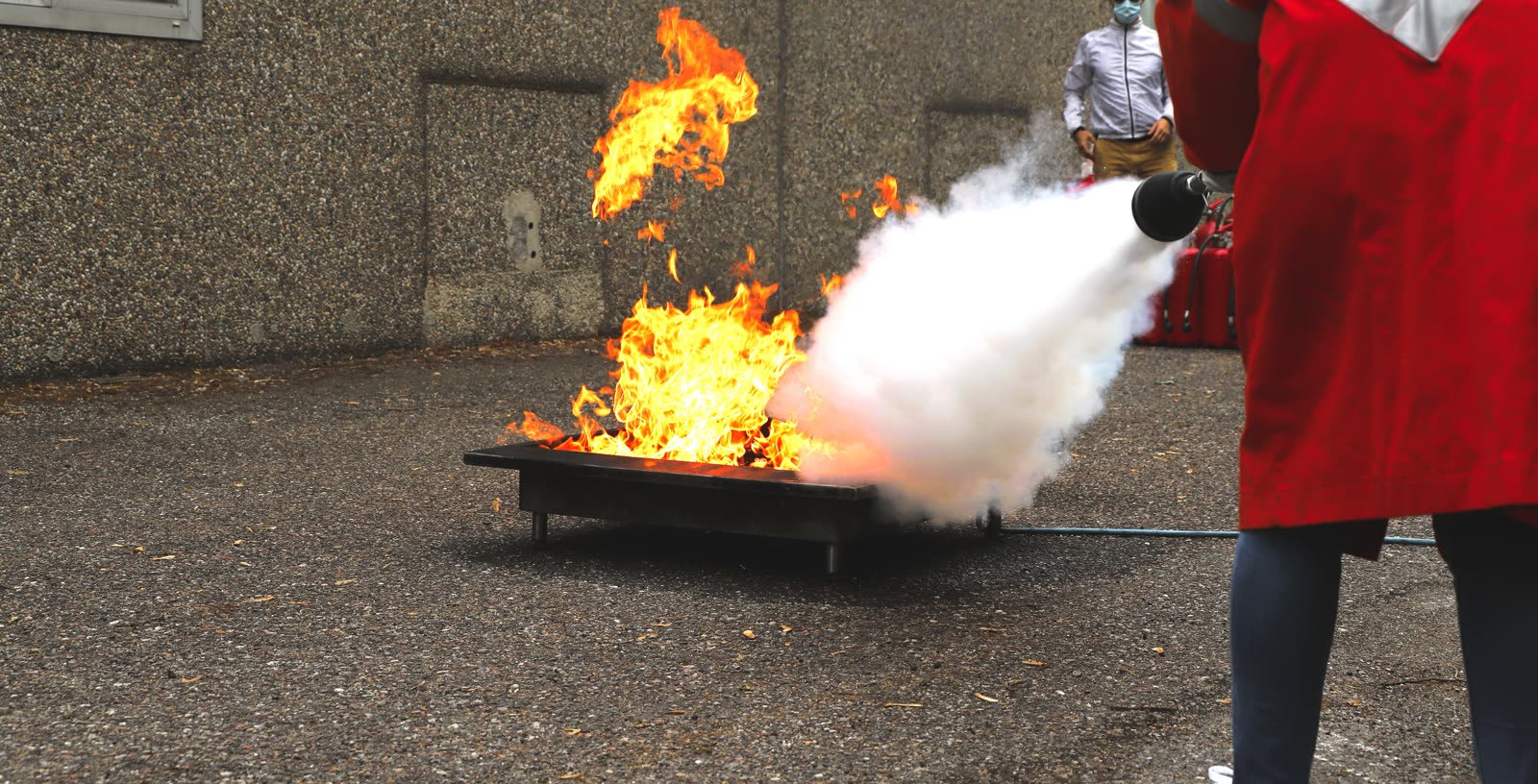 Fire warden training with a fire extinguisher