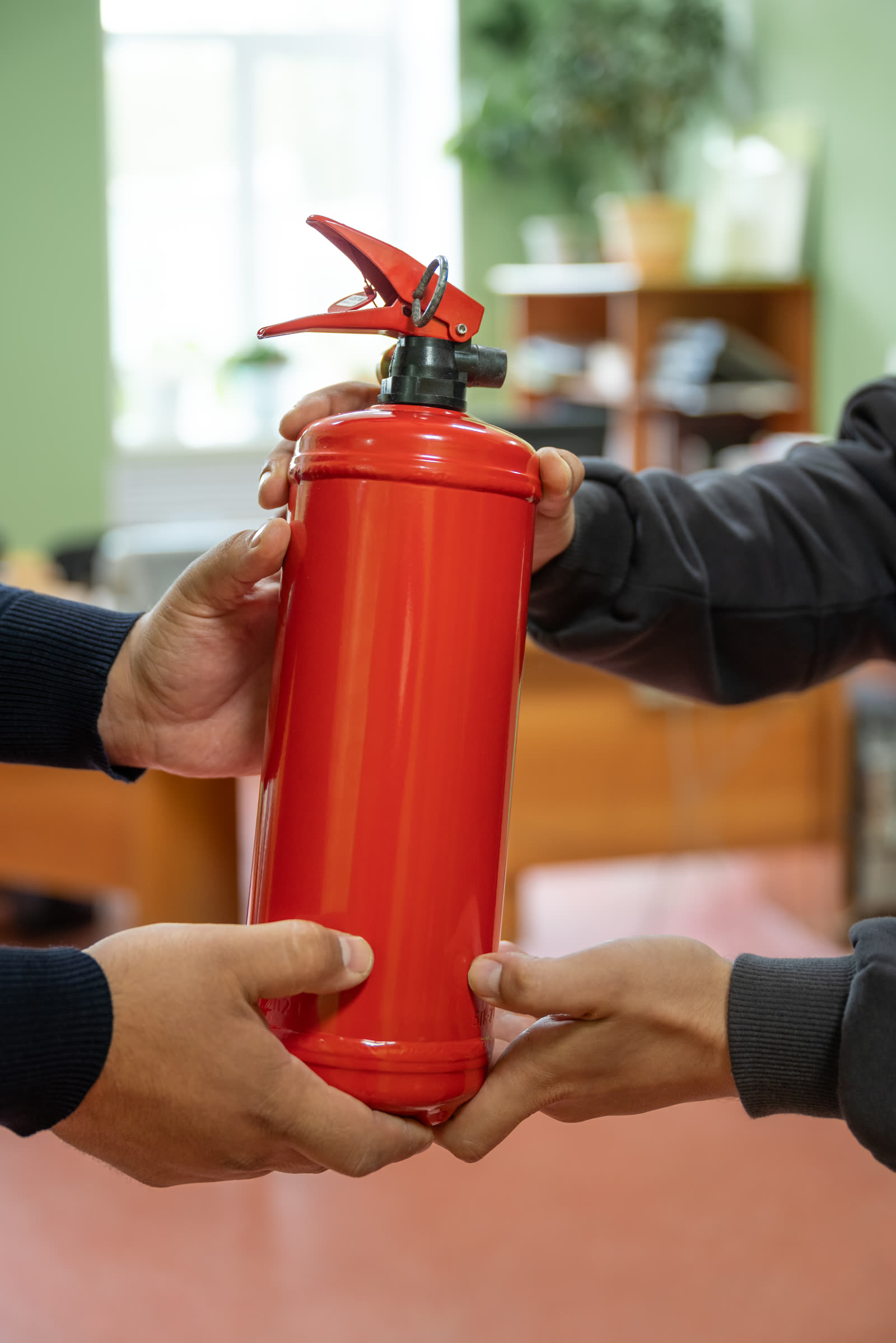 Fire warden training with a fire extinguisher